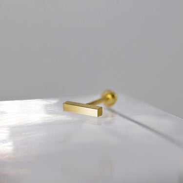 Piercing de oro Labret con forma de barra