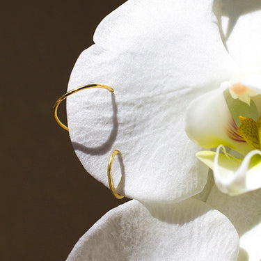 Charlotte Orbit en oro amarillo 18kt sobre orquidea
